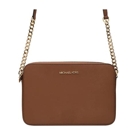 michael kors ginny bag gold|Ginny Medium Pebbled Leather Crossbody Bag .